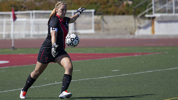 City College goal keeper and captain Brianna Robinson (No. 1) defends the goal Friday, Sept. 13, 2013 against Taft College. 