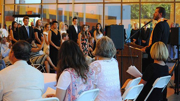 Dr. Eskandari-Qajar (left), Dr. Alice Sharper (center), Dr. Lori Gaskin (right center) and Mark Sanders (right) let the inductees pledging. Sept. 27, 2013, in Santa Barbara, Calif.