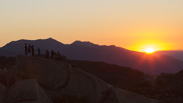 Members of the Excursion Club wake up to see the sunrise after a night of camping at Lizards Mouth early Saturday morning, Oct. 19, 2013 in the Santa Ynez mountains.