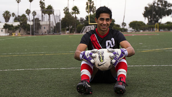 Juan Rodriguez poses for a portrait at City Colleges La Playa Stadium, on October 9, 2013. While keeping his mind on the field as freshman goalie, he pumps up before with the FIFA soccer video games.