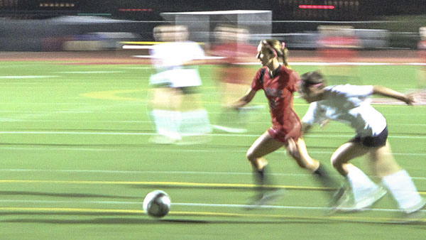 In Santa Barbara, Calif. At Del Playa Stadium, Forward Brandie Harris shows off her unstoppable quickness against Cuesta, ending in another goal.