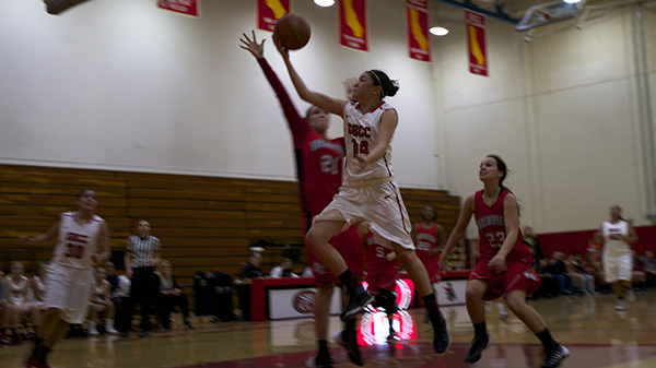 Jasmine Mata (No14) shoots against Andrea Harris (No21) during the basketball game against Bakersfield College at the City College Sports Pavilion in Santa Barbara, Calif. on Tuesday, Nov. 19, 2013.