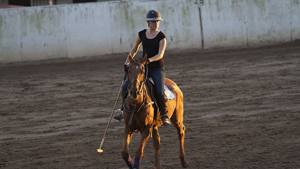 Lauren Kelbe, City College student, practices polo at the Santa Barbara Polo School in Carpinteria, Calif. on Nov. 14, 2013.