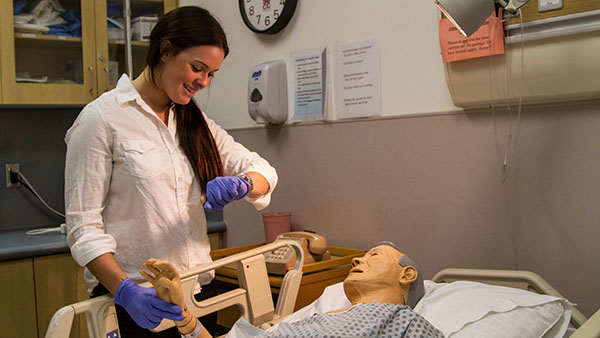 Skylar Lane, newly accepted applicant into the Career Israel Program, poses in the Nursing Administration Building on City College campus, on Nov. 26, 2013.  As a public health major, she is the youngest student to be accepted into this group.