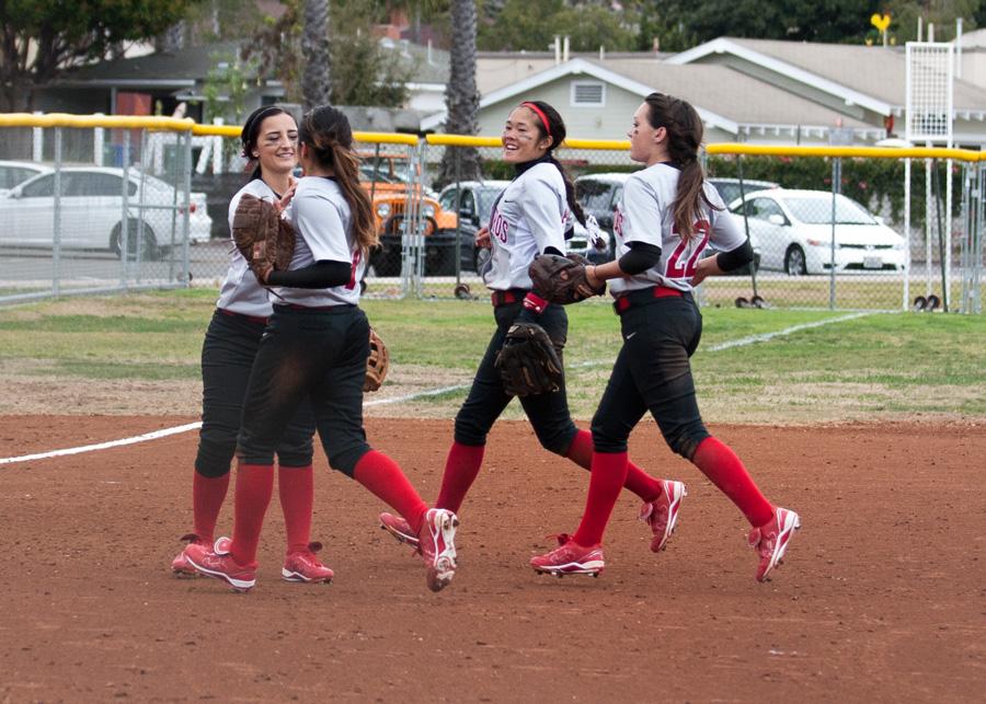 The Vaqueros celebrate after winning the first of two games against Pasadena City College on Feb. 8, 2014, at Pershing Park in Santa Barbara, Calif.