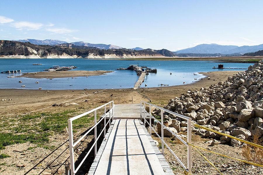 Water levels at Lake Cachuma, Calif. are at historic lows on Feb. 5. The boat marina has had to lower the floating docks past the stair level and lake visitors have to walk through a section of shoreline before reaching the dock.