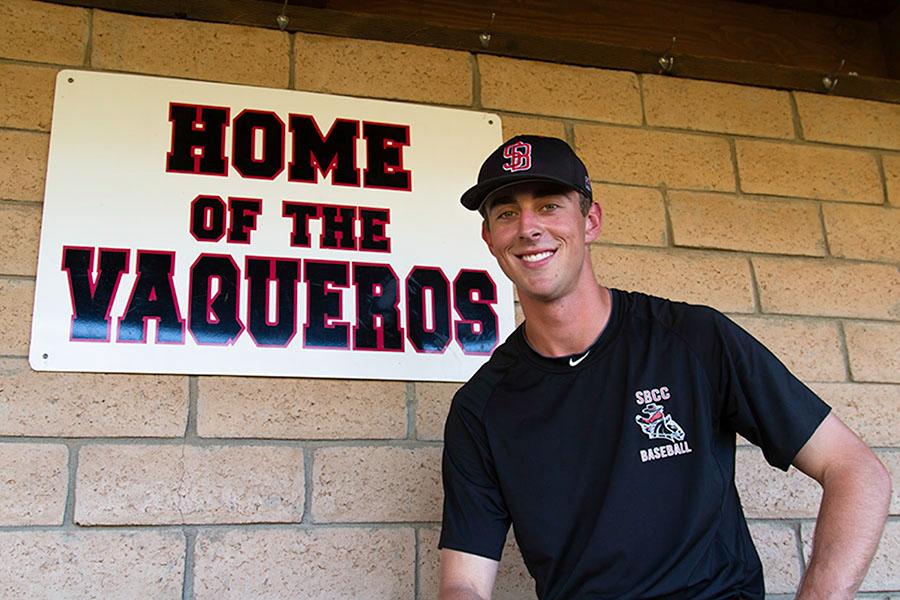 Santa Barbara City College sophomore pitcher Tyler Gilbert sits in the dugout of Pershing Park on Feb, 5, 2014, in Santa Barbara, Calif. Gilbert leads the undefeated Vaqueros and has committed to play at the University of Southern California next year.