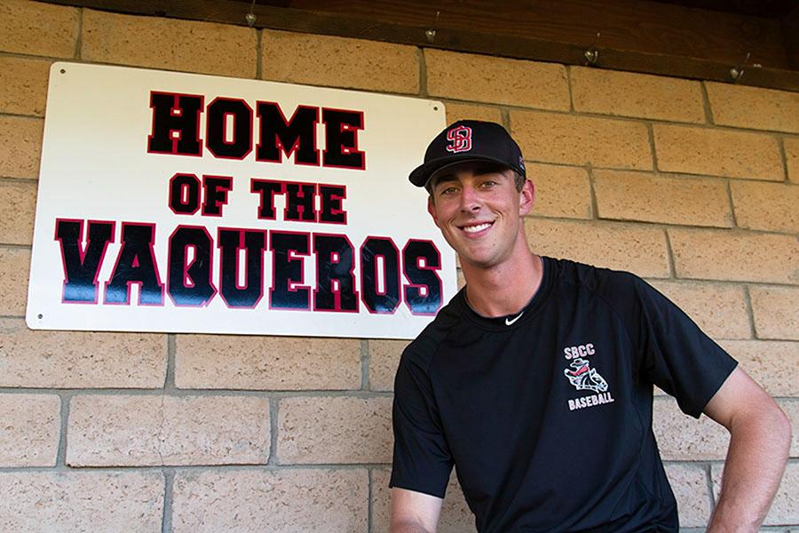 Santa Barbara City College sophomore pitcher Tyler Gilbert sits in the dugout of Pershing Park on Feb, 5, 2014, in Santa Barbara, Calif.  Gilbert leads the undefeated Vaqueros and has committed to play at the University of Southern California next year.  