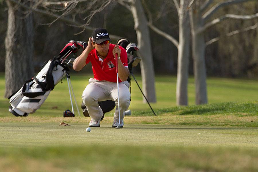 On Monday, February 17, 2014 Santa Barbara City College Golf Team member Jackie Chan, eyes up a putt for birdie on the 2nd hole of the Alisal Ranch Golf Course. The Course and Santa Barbara City College played host to the Western State Conference number 2 tournament.