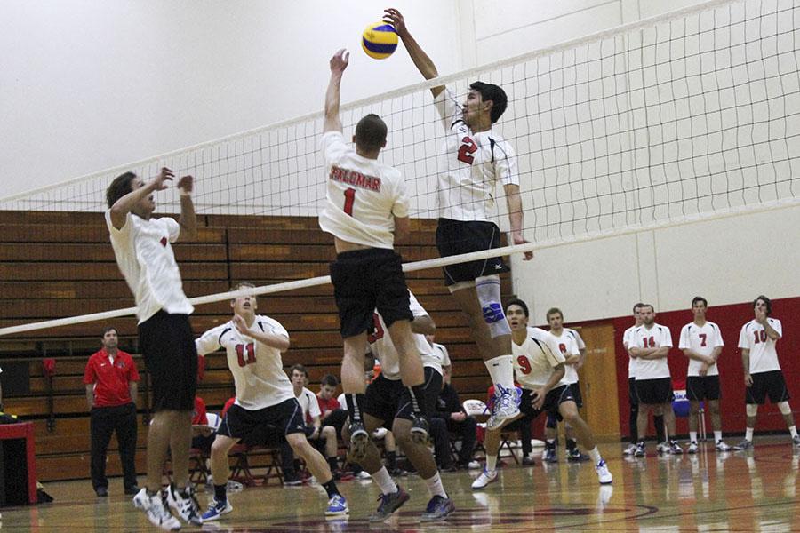 Owen Yoshimoto (No.2) blocks the ball against Palomar College earning the Vaqueros a point on Tuesday, Feb. 11, 2014, in the Sports Pavilion at City College in Santa Barbara, Calif.