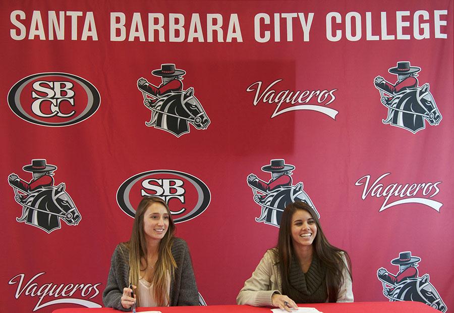 Soccer players Brandie Harris, left, and Heather Rivera sign their letters of intent to California State University, San Bernardino, on Thursday, Feb. 6, 2014, in Santa Barbara, Calif.