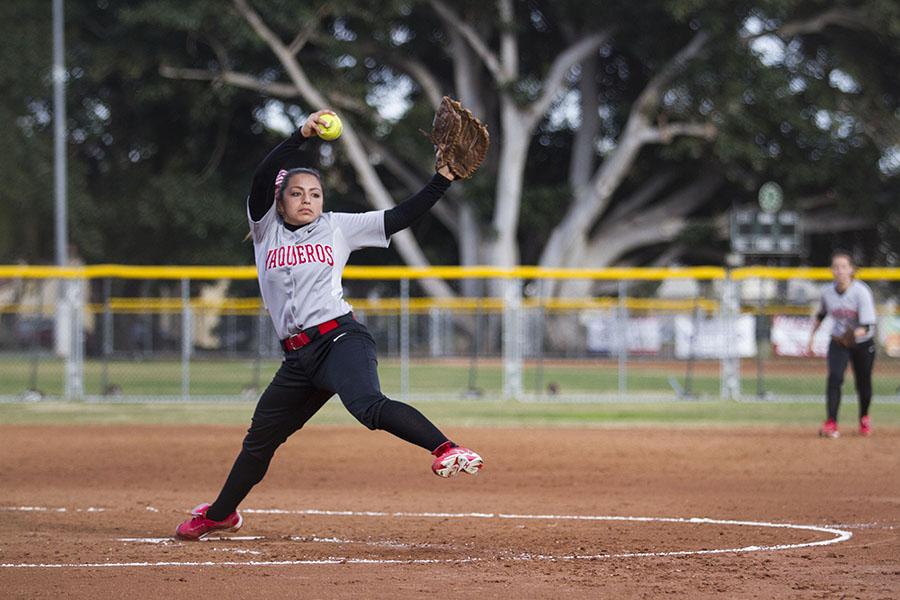 Celeste Acosta (No.1) pitches the ball during the Vaqueros’ win against L.A. Mission College on Tuesday, Feb. 11,  2014, at Pershing Park in Santa Barbara, Calif.  City College won 9-5.