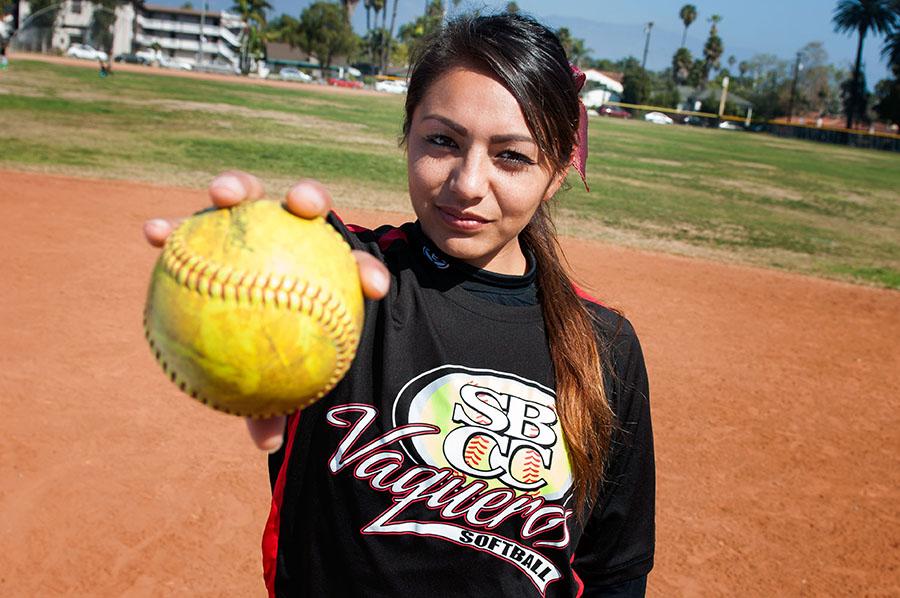 Vaqueros softball pitcher Celeste Acosta holds up a ball at Pershing Park on Feb. 23, in Santa Barbara. Acosta’s four victories have accounted for all of the Vaqueros wins this season.