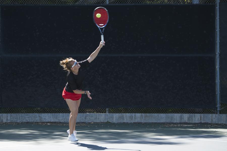 Teresa Downey serves the ball during a match against Antelope Valley Tuesday, March 18, at Pershing Park in Santa Barbara. The Vaqueros won, 7-2, and Downey remained undefeated in conference play.