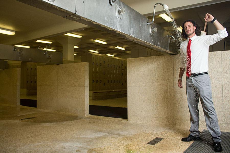 Nicholas Steil, vice president of Student Affairs, visits the mens locker room on Friday, Feb. 28, in the Sports Pavilion at City College. Steil, 35, has been pushing for the initiative to allow homeless students access to locker room showers for over a year.