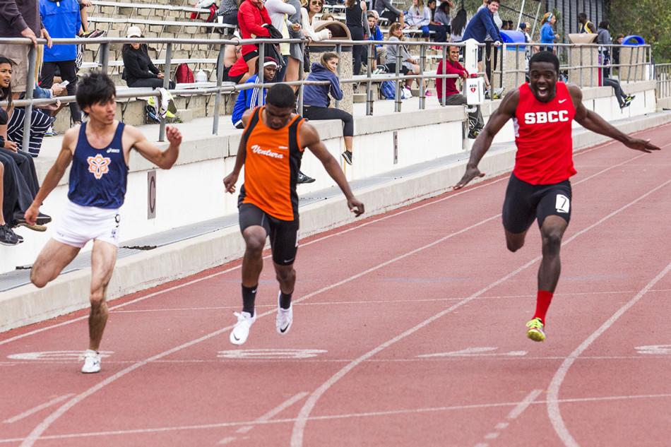 City College freshman sprinter, Dominique Dixon (right), competes in the 100-meter event of the Easter Relays at La Playa Stadium on Friday, March 21, in Santa Barbara. Dixon finished the event with a time of 11.61 seconds.