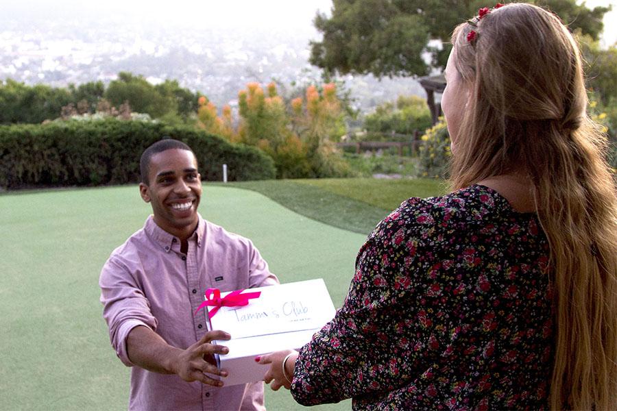 Alex Beauchamp, co-founder, of Tammy’s Club, delivers a box of tampons to one of their customers, Carly Carroll, in Santa Barbara. Tammy’s Club is a tampon service where customers enroll in a monthly subscription that is personalize to women’s individual preference.