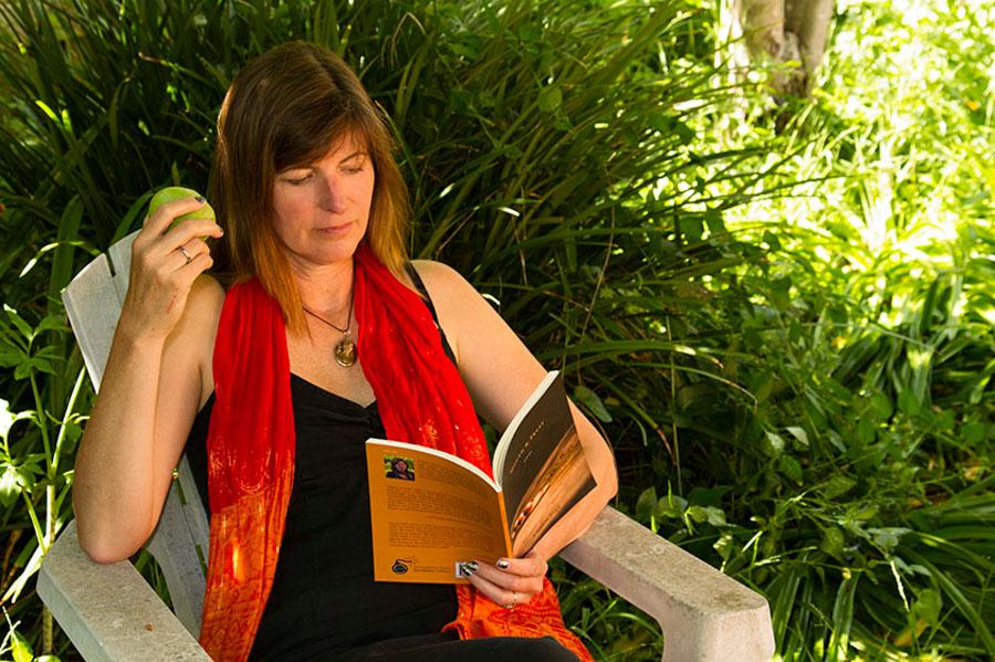 Santa Barbara’s newest Poet Laureate, and former City College student (2003-2005), Chryss Yost enjoys an apple and reads a few of her poems from her book entitled Mouth & Fruit on Sunday, April 20. Yost became the Poet Laureate of Santa Barbara in April of 2013, and will keep that title until 2015.