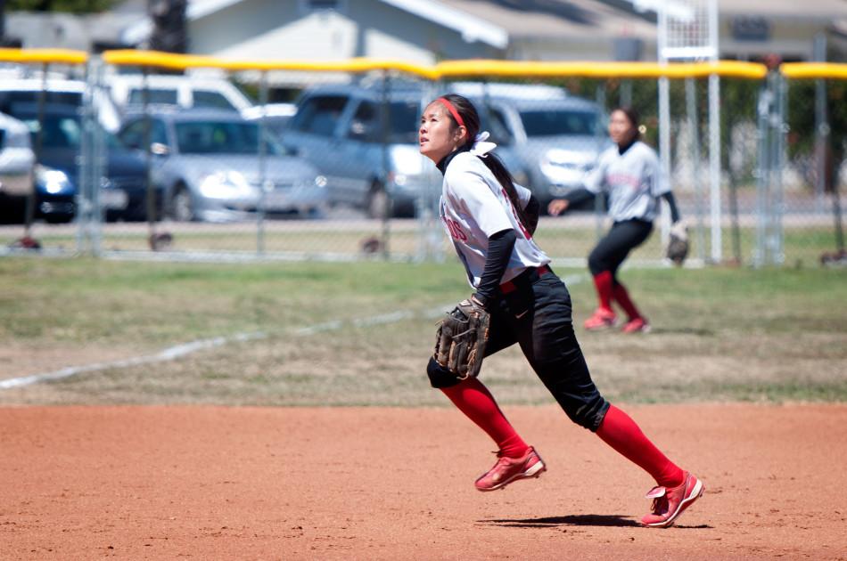 Alice Cen (No. 23) runs to catch the ball in the first of two games against Moorpark College on Tuesday, April 22, at Pershing Park. Cen, a sophomore shortstop, leads the team in batting average at .398.