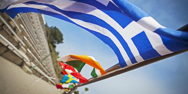Flags fly at City College's La Playa Stadium for annual international week.