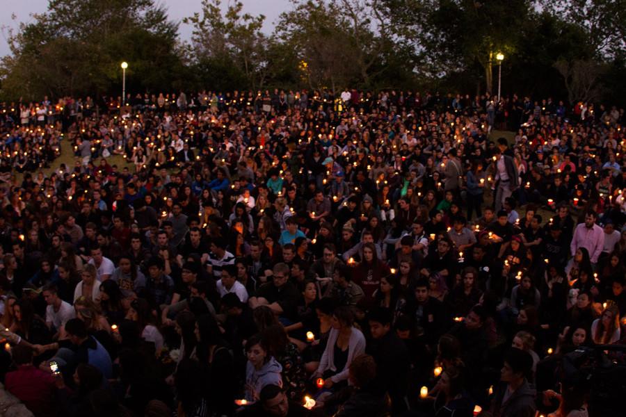 Students and community members share their thoughts on the Isla Vista shooting during the vigil on Saturday, May 24, 2014, at Anisqovo Park in Isla Vista, Calif.