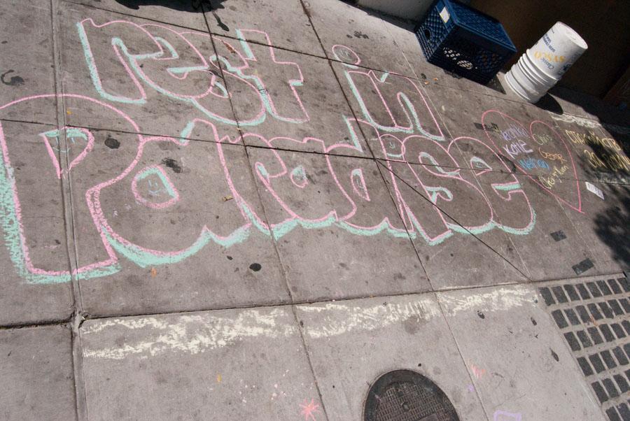 Rest in Paradise and a heart around the names of the victims is drawn at a chalk memorial held on the 6500 block of Pardall Road, at the IV Deli Mart on Friday, May 30, 2014 in Isla Vista, Calif. UCSB students Christopher Martinez, 20, Chen Yuan Hong, 20, George Chen, 19, Wihan Wong, 20, Katie Cooper, 22, and Veronika Weiss, 19, all tragically lost their lives on the night of the IV shooting.