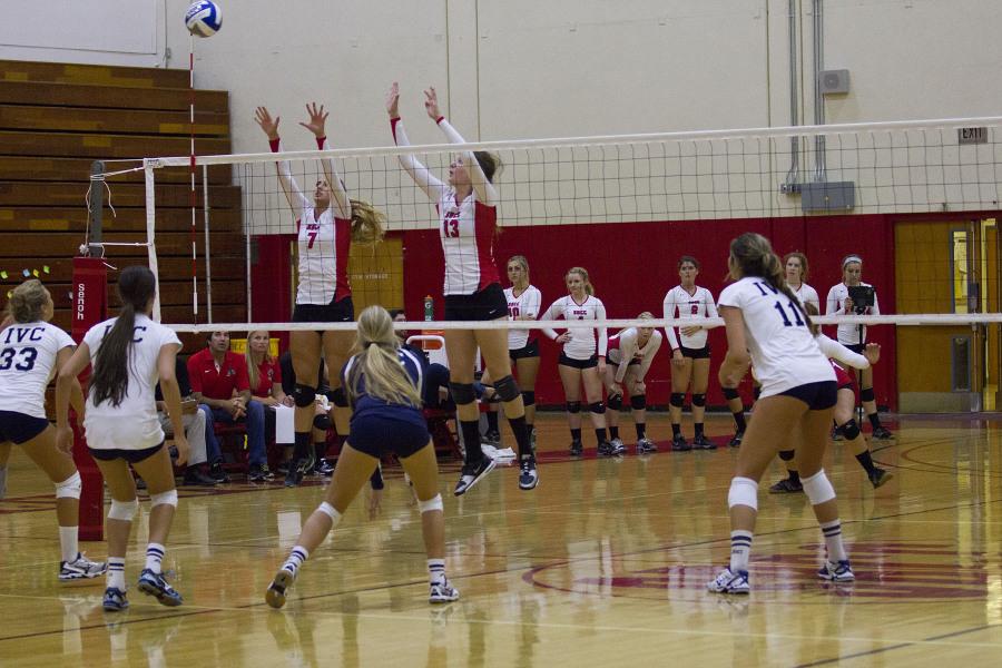 Madelon Leiphardt (No. 7) and Paige Sabin (No. 13) go for the block against Irvine Valley College Wednesday, Sept. 17, at City College’s Sports Pavilion. The Vaqueros lost at home to Irvine Valley 3-0.