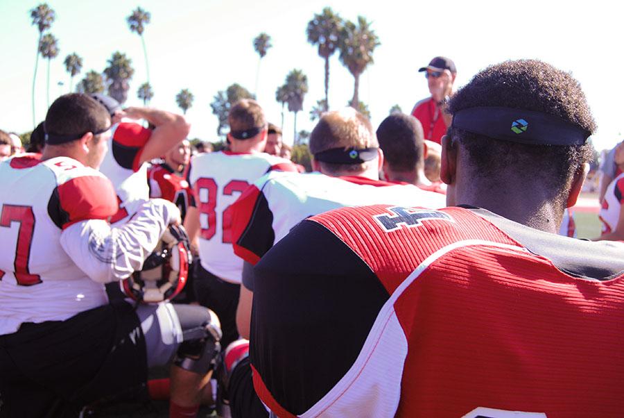 Vaquero football players wear the Triax headbands, a new method being used to track head impact data and flag the coach on forceful impacts, at practice Monday, Sept. 15, at La Playa Stadium. The headbands are being worn by Vaquero's football and soccer teams.