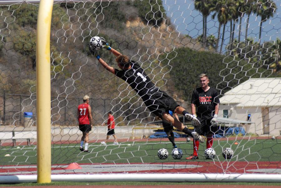 City College goalkeeper Tristan Cooper (No. 1) defends the goal from a teammate during practice on Tuesday, Sept. 2, at La Playa Stadium. The men's team finished second in the Western State Conference last season.