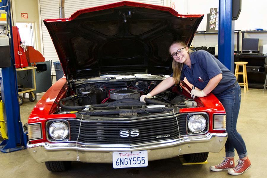 Kianna Silva, 18, in the Automotive Department with a 1972 Chevelle, Wednesday, Oct. 7, at City College in Santa Barbara. Silva is pursuing her associate degree in Automotive Service and Technology.