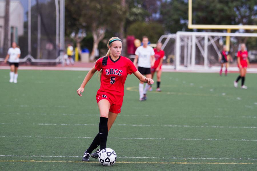 City College forward Aimee Ryan (No. 5) takes the ball down the pitch during City Colleges game against Cuesta College Tuesday Oct. 14 at La Playa Stadium in Santa Barbara, Calif. Ryan scored the game winning goal to improve her teams conference record to 3-0-2. “ It felt good to come in and get that second goal,” said Ryan.