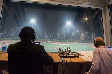 Broadcaster Ryan Graff (left), former Director of Broadcasting at Occidental College, and color analyst Sam Feilding, look out over La Playa Stadium during a live broadcast of a Vaquero's men's soccer game in Santa Barbara, Calif. Graff joined the Santa Barbara City College Athletics Department for the 2014-2015 school year to be the lead play-by-play voice of the Vaqueros and Assistant Sports Information Specialist.