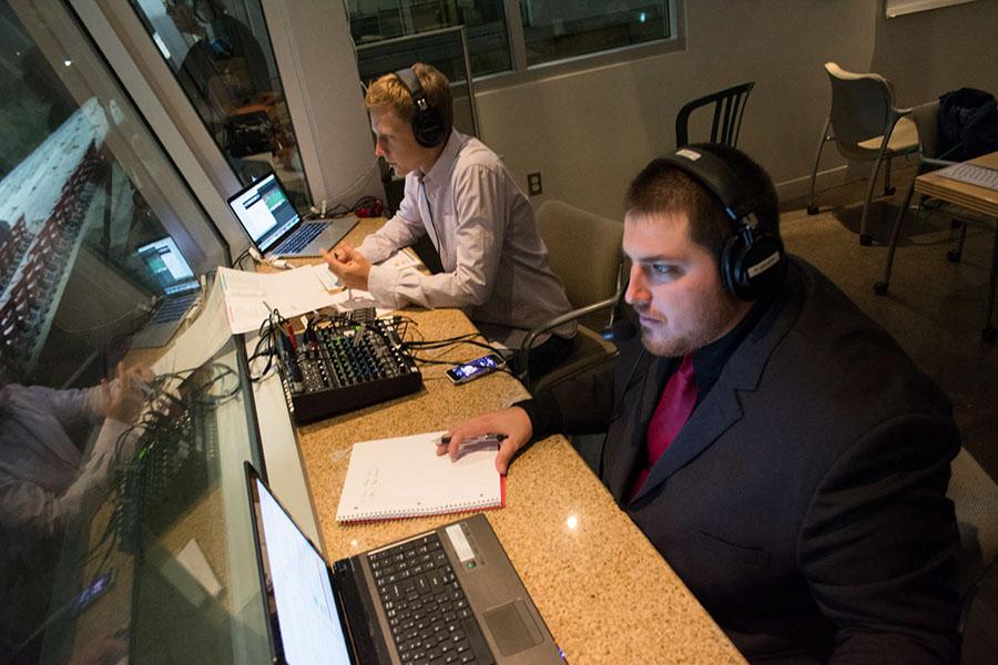 Broadcaster Ryan Graff (right), former Director of Broadcasting at Occidental College, and color analyst Sam Fielding, look out over La Playa Stadium during a live broadcast of a Vaquero's men's soccer game, Tuesday night, Oct. 7, in Santa Barbara, Calif. Graff joined the Santa Barbara City College Athletic Department for the 2014-2015 school year to be the lead play-by-play voice of the Vaqueros and Assistant Sports Information Specialist.