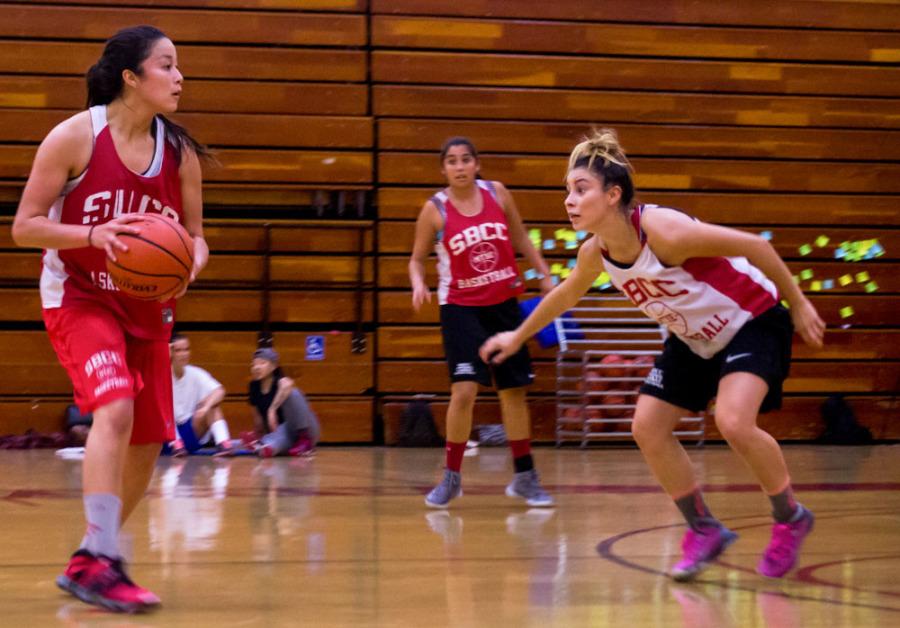 Vaquero guard Darla Morales (No. 22) looks to make a pass down the court as Vaquero guard Mizhrua Bautista (No. 3) moves forward to steal the ball during a practice game, Thursday, Nov. 13, in the Sports Pavilion in Santa Barbara. The womens basketball team will play Fullerton College Friday at 7 p.m. for their second game of the season.