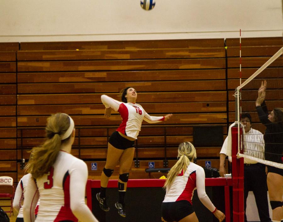 Vaquero outside hitter Katelynn Womack (18) prepares to spike the ball during a volley in the second set of the Santa Barbara City College Women's Volleyball match against the Ventura College Raiders Wednesday night Nov. 12 at Santa Barbara City College, Santa Barbara, Calif. SBCC's 3-0 route of the Raiders gave head coach Ed Gover his 300th career victory.
