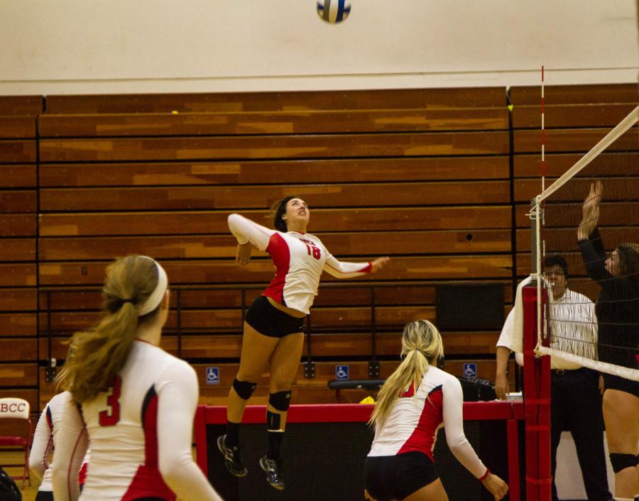 Vaquero outside hitter Katelynn Womack (18) prepares to spike the ball during a volley in the second set of the Santa Barbara City College Womens Volleyball match against the Ventura College Raiders Wednesday night Nov. 12 at Santa Barbara City College, Santa Barbara, Calif. SBCCs 3-0 route of the Raiders gave head coach Ed Gover his 300th career victory.