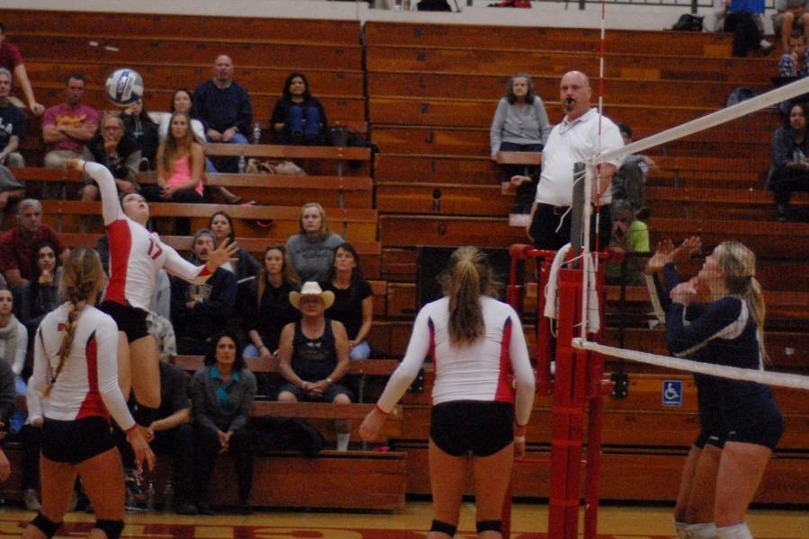 Santa Barbara City College’s Makinna Malady (No. 17) spikes the ball for a point against Orange Coast College in the first round of the playoffs on Tuesday, November 25, 2014 in Santa Barbara Calif. The Vaqueros lost in the fifth set after winning the first two.