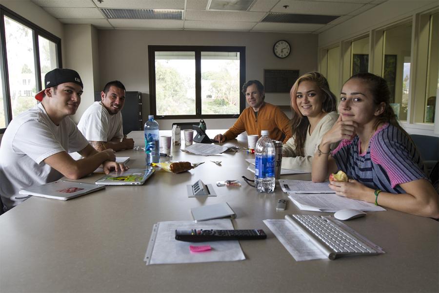 From left: Trace Massa, coach Manny Raya, coach Marc Bobro, Nikki Romming, and Alyssa Whorton. City College’s Ethics Team meets in the Luria Library to prepare for this weekend’s upcoming Ethics Bowl Competition on Dec. 5 in Santa Barbara. City College is the only two-year institution to host a 2014 regional competition.