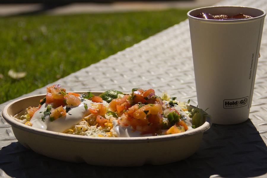 Tacos with steak, lettuce, pico de gallo, shredded cheese, sour cream, lime, cilantro and onions, and an ice cold drink, Tuesday, Feb. 24, at City College’s Favela Burrito Shack on East Campus.