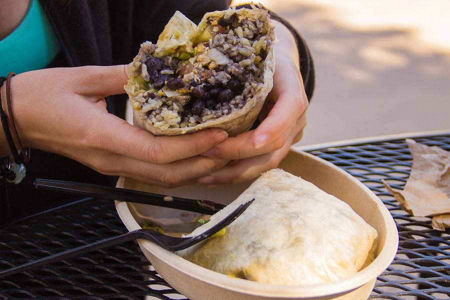 A burrito with chicken, brown rice, black beans, caramelized onions, lettuce, pico de gallo and guacamole, Tuesday, Feb. 24, at City College's Favela Burrito Shack on East Campus.