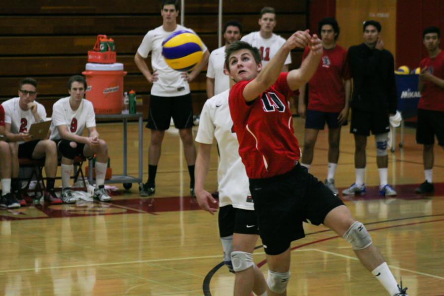 Vaquero’s libero Casey Alper (No. 10) twists into a dive to catch a volley during the fifth set in a match against Santa Monica College, Wednesday, Feb. 25, in the Santa Barbara Sports Pavilion on East Campus. Despite their overall loss of 2-3, the Vaqueros played a close game, tying in the first four sets only to lose the final set by 2 points with a final score of 16-18 in the fifth set.