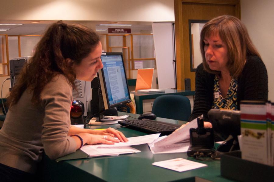 French and Spanish double major Veronica Ghisoni (left) gets information about applying for an associate degree from Academic Counselor Christy Grant, Thursday, Feb. 19, at the Academic Counseling Center on East Campus. Nine new counselors are being hired at city college; five under Academic Counseling, two through Express to Success (ESP), one through the Transfer Achievement Program, and another through Extended Opportunity Programs and Services.