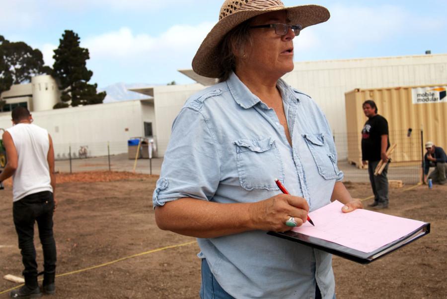 Karen Flagg, Ecological Restoration and Environmental Horticulture teacher, explains the blueprint of the landscape area, Friday, Feb. 6, near the ECC buildings on East Campus at City College. To get more information about this project and future Santa Barbara restoration projects, go to ‘growingsolutions.org’ or find them on Facebook at ‘Growing Solutions Restoration Education Institute.’