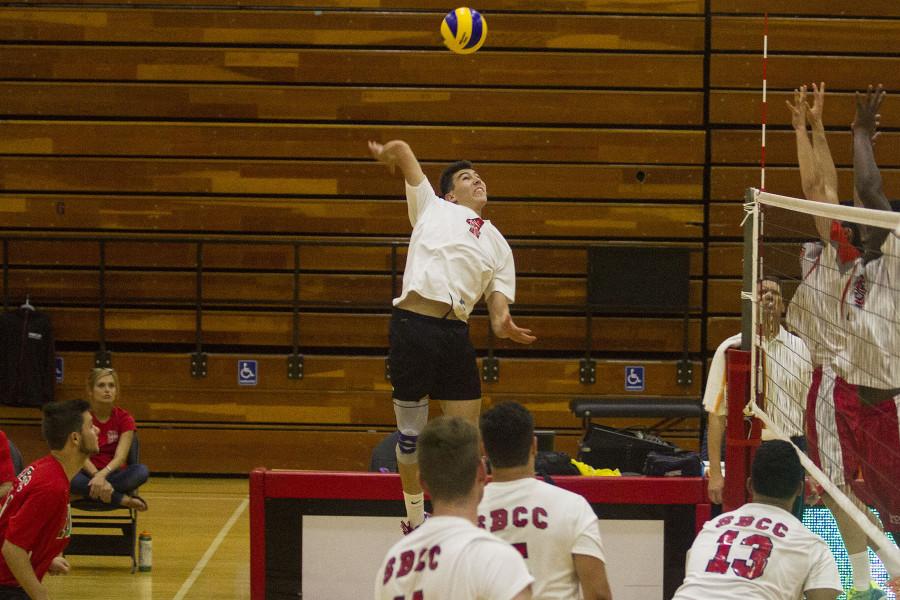 Outside hitter Taylor McCluskey (No. 4) returns the ball over to the other side and scores a point during their match against L.A pierce, Wednesday, March 25, in the Sports Pavilion at City College. The Vaqueros won after a closely tied game with a 3-5 victory.