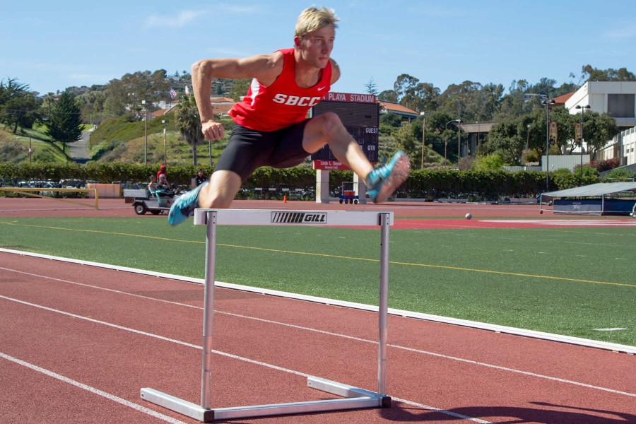 Bas Van Leersum is one of the leading athletes on the City College track team this year, as both a hurdler and a sprinter, Thursday, March 5, at La Playa Stadium in Santa Barbara.