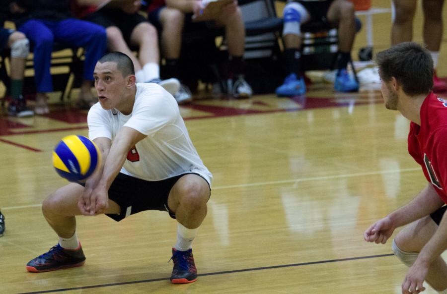 Vaqueros outside hitter Jaiden Pina (No. 8) returns a low volley headed his way during the during the first set in a match against El Camino, Wednesday night, March 11, in the Sports Pavilion on East Campus in Santa Barbara. The Vaqueros played three close sets with scores of 25-22, 25-20, and 26-24 amounting to an overall 3-0 win. Their next home game will be against Moorpark College on Friday, March 13.