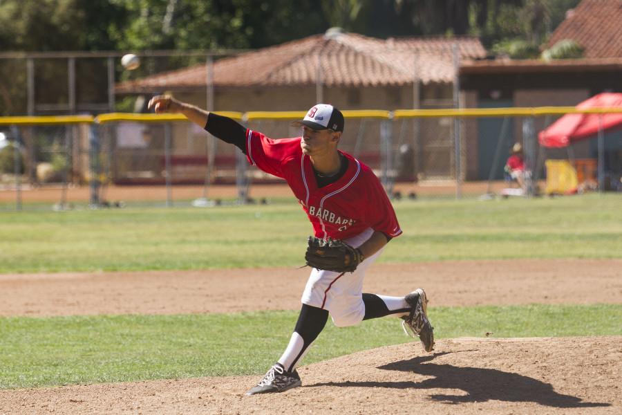 City College’s Justin Bruce (No. 11) throws a pitch during the game against Allan Hancock College Saturday, March 14, 2015 at Pershing Park, Santa Barbara. Big conference win. I just had to go out there and throw pitches, Bruce said.