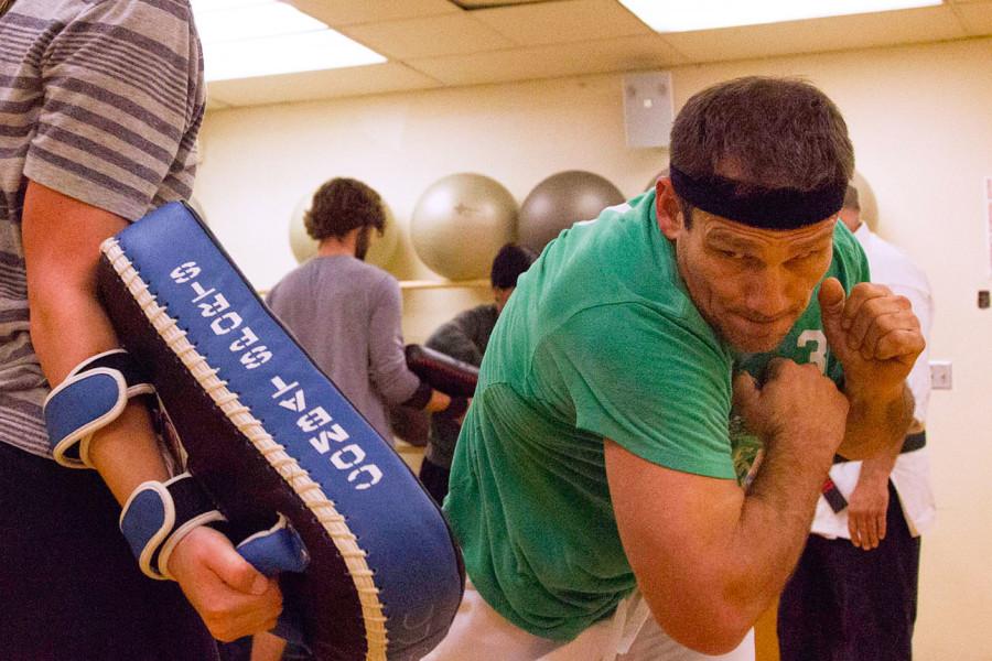 City College Kinesiology Major Joshua Glass and his sparing partner Brianna Robert, Tuesday March 5, at City College in Santa Barbara. Karate teacher Duane Erdman also teaches an online self-defense class.