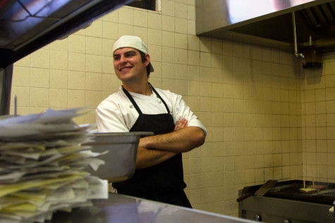 Culinary Arts student Pierre-Alexandre Tremblay is stationed at the grill, cooking burgers and fries for the City College JSB Café, Thursday, March 19, 2015, on East Campus in Santa Barbara, Calif. Third-semester Culinary students gain real world practice working in the JSB Café and serving in the John Dunn Gourmet Dining Room.