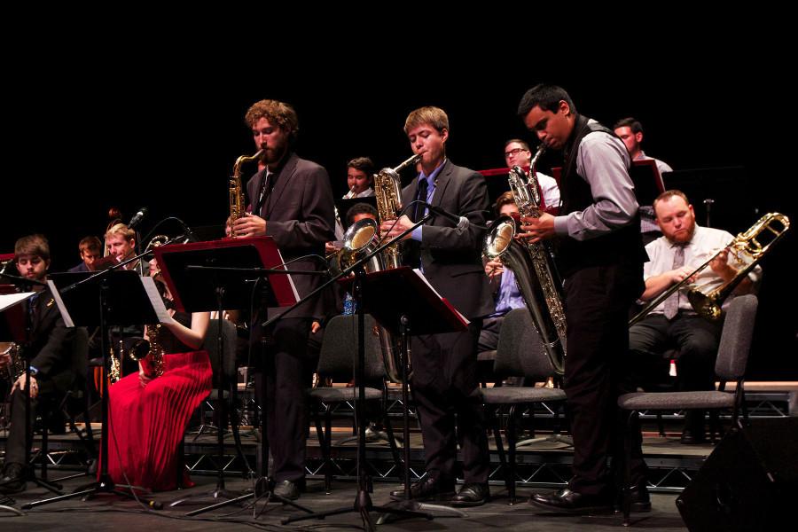 Members of the Lunch Break band, Kyle Tefft (right) plays the tenor saxophone, while Michael Bowers and Andrew Barone each play the baritone sax, at the Big Band Blowout jazz concert, Monday, April 27, in the Garvin Theatre.